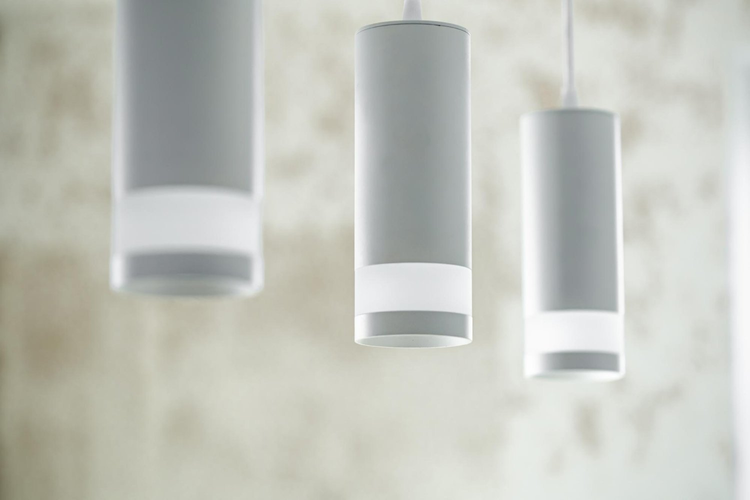Spotlight ceiling lights highlighting products on display in a modern retail store.
