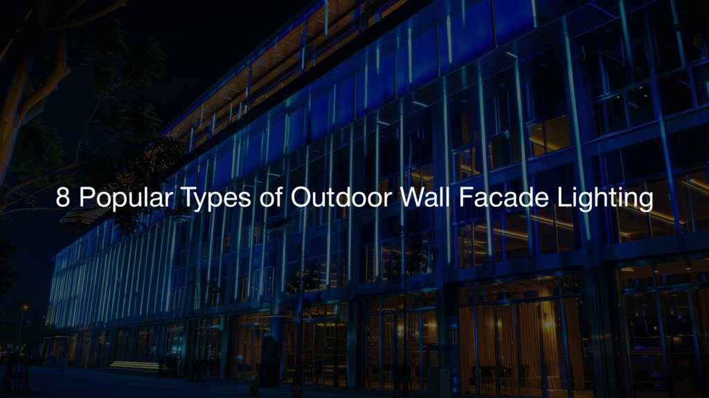 Outdoor Wall Facade Lighting emphasizing the vertical lines of a modern glass structure.